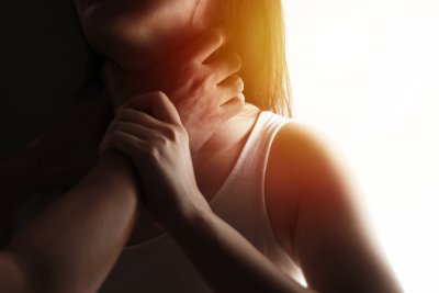 Man choking a woman